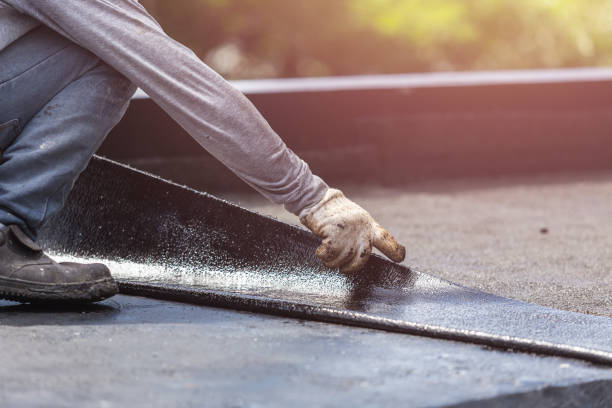 Professional Basement Waterproofing technician working in Toms River, NJ